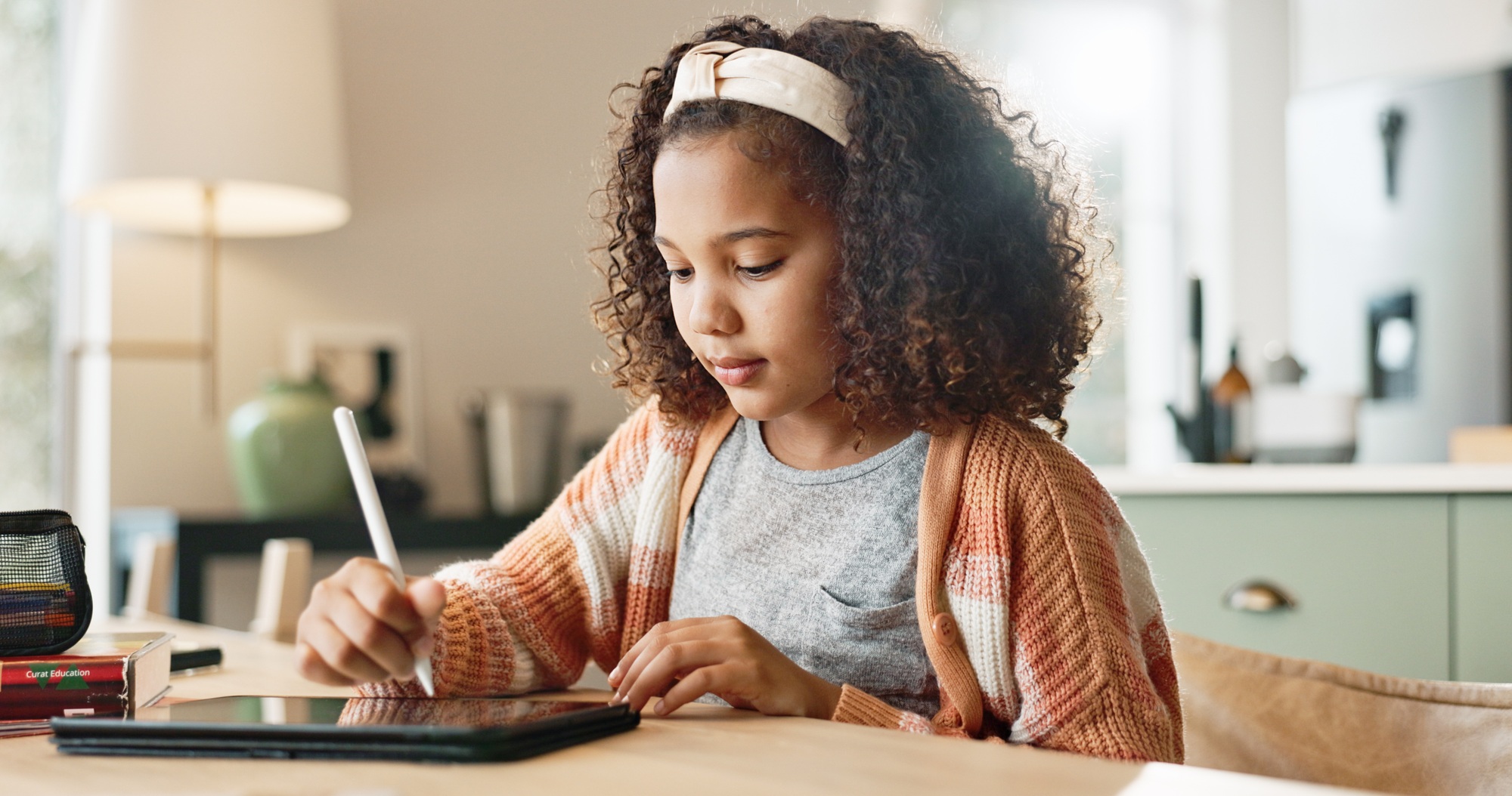 Girl kid, home and sketch on tablet for homeschool, learning and growth or development of motor ski