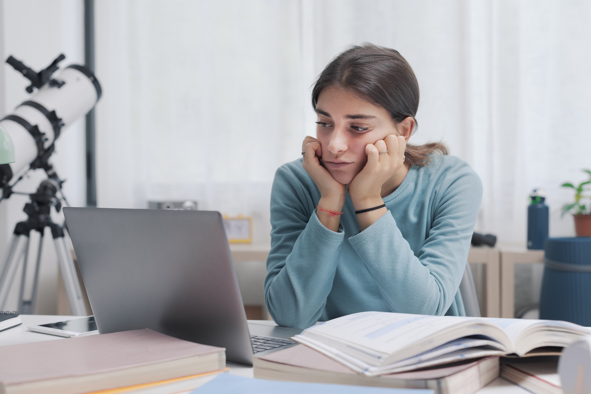 Student taking online classes at home